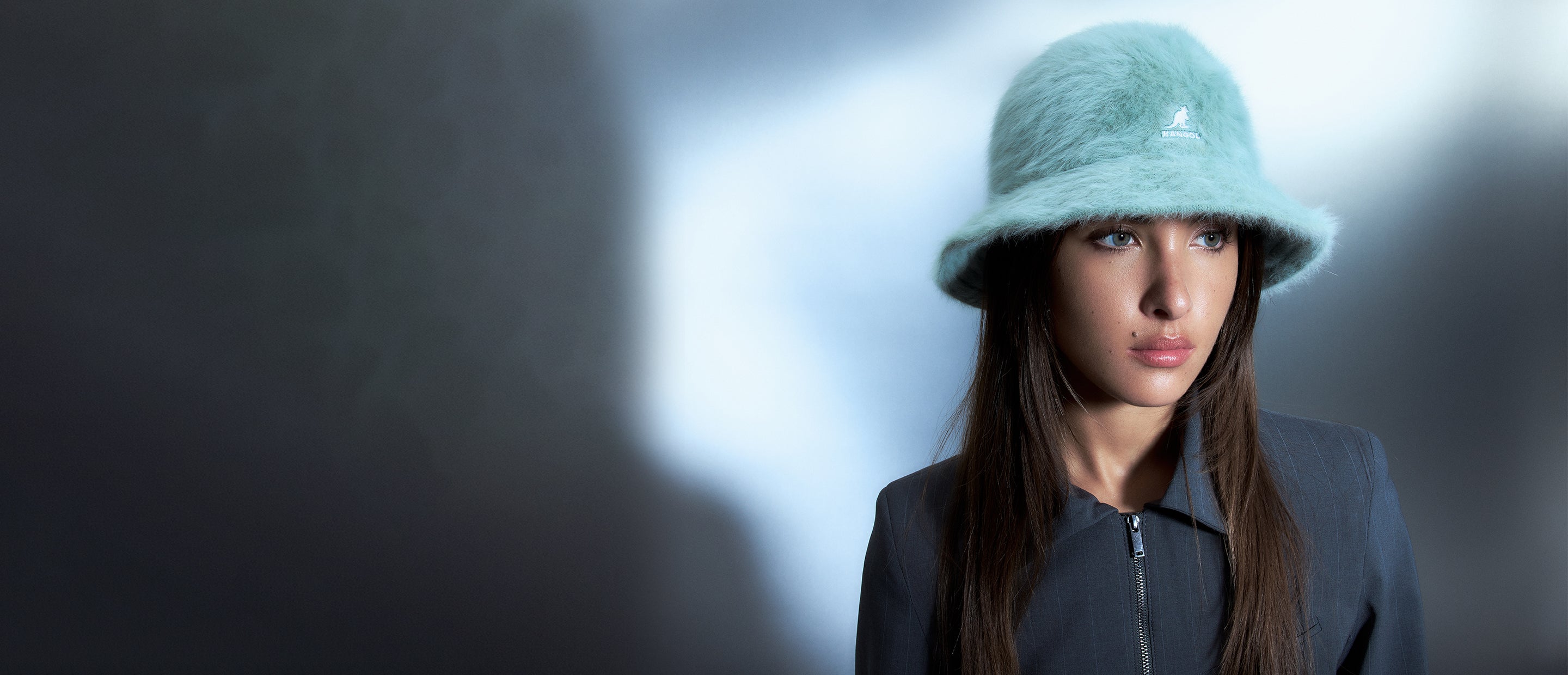 Female model wearing the Kangol Furgora Casual.